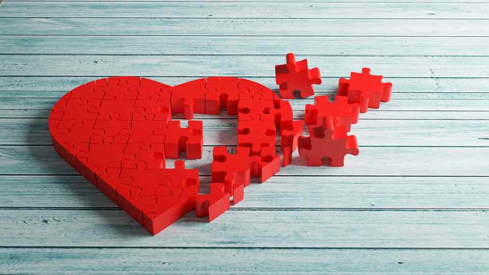 Red heart puzzle pieces